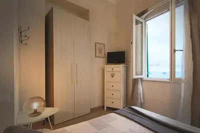 Letto o letti in una camera di Il Portico