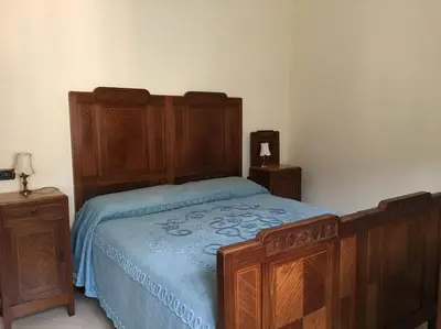 Letto o letti in una camera di La casa sul ponte: spacious apartment in Zoagli