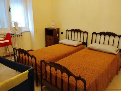 Letto o letti in una camera di La casa sul ponte: spacious apartment in Zoagli