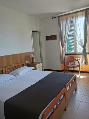 Letto o letti in una camera di Hotel Montallegro
