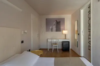Letto o letti in una camera di Ca' Tazzoli, MantegnaHotels