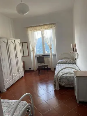 Letto o letti in una camera di Ca' Bianca