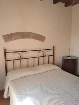 Letto o letti in una camera di Agriturismo La Burlanda