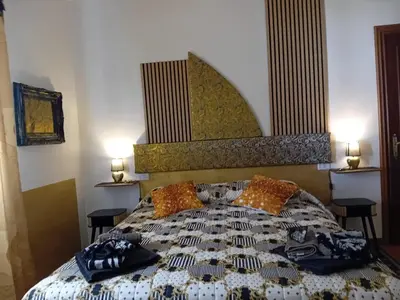 Letto o letti in una camera di La Sosta in Lunigiana