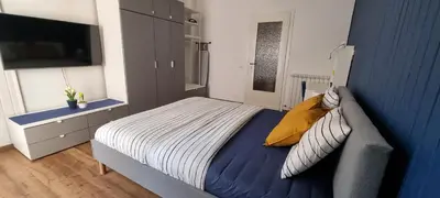 Letto o letti in una camera di Casa Alexandra