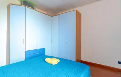 Letto o letti in una camera di Lovely Apartment In Cogorno With Wifi