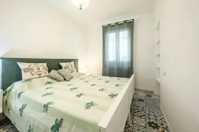Letto o letti in una camera di Le Finestre sul Borgo 2