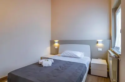 Letto o letti in una camera di GuestHost - Comfy & Roomy Apt - View on the Ligurian Hills!