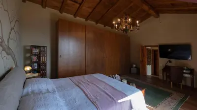 Letto o letti in una camera di Ca' di Max