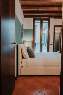 Letto o letti in una camera di Tra le case di Reggio - Zaccagni