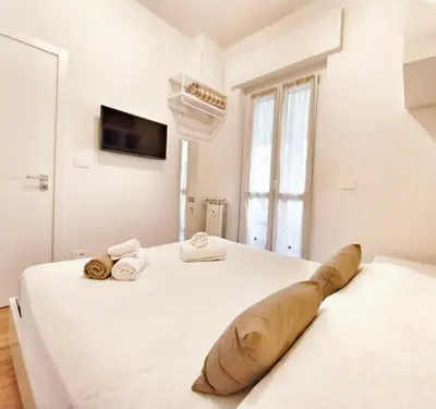 Letto o letti in una camera di Attic Apartment, Air Conditioning, Fast WiFi