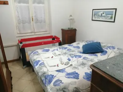 Letto o letti in una camera di La casetta nella Città dei due Mari