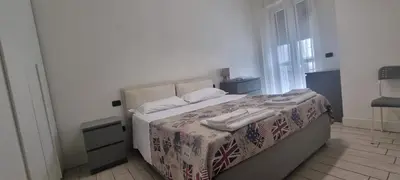 Letto o letti in una camera di Casa Adriana