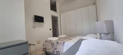 Letto o letti in una camera di Casa Adriana