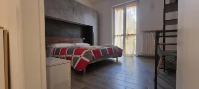 Letto o letti in una camera di Casa Roma