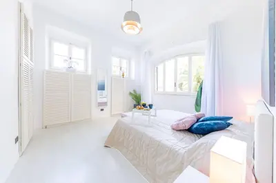 Letto o letti in una camera di [Villa Portofino] Piscina privata • Giardino • 3 parcheggi