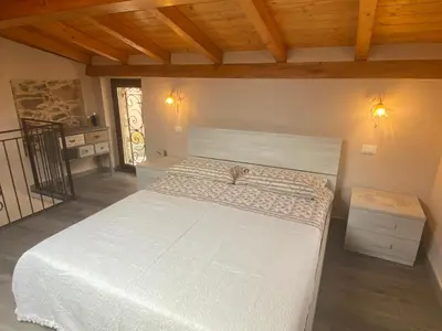 Letto o letti in una camera di Casa Dell’Angelo Serafino