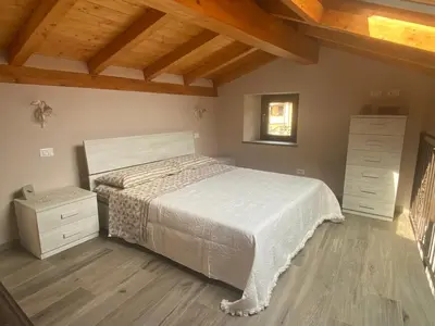 Letto o letti in una camera di Casa Dell’Angelo Serafino