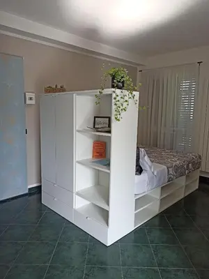 Letto o letti in una camera di Il Glicine cozy appartamnent, near Sestri Levante between Cinque terre e Portofino