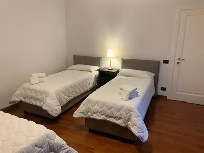 Letto o letti in una camera di Foresteria La Corte
