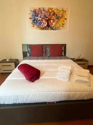 Letto o letti in una camera di Host San Pietro