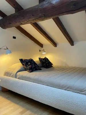 Letto o letti in una camera di Mansarda Laurent
