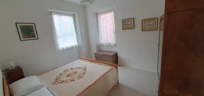 Letto o letti in una camera di casa nel verde della Val di Vara