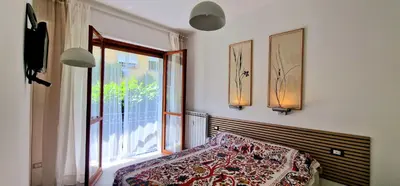 Letto o letti in una camera di Casa del Mare- Bluchalet