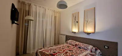 Letto o letti in una camera di Casa del Mare- Bluchalet