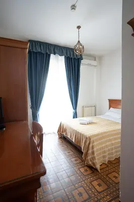 Letto o letti in una camera di Hotel Napoleon