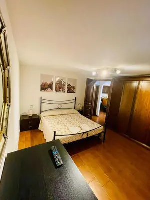Letto o letti in una camera di Appartamento Cá Medé