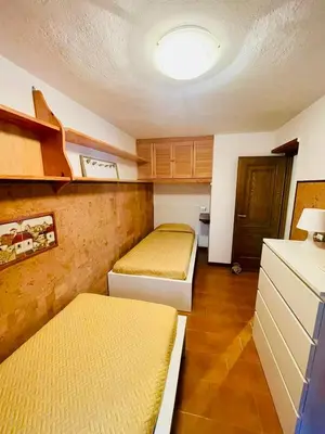 Letto o letti in una camera di Appartamento Cá Medé