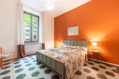 Letto o letti in una camera di GuestHost - Borgo Bliss in Parma's San Giuseppe District