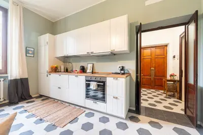 Cucina o angolo cottura di GuestHost - Borgo Bliss in Parma's San Giuseppe District