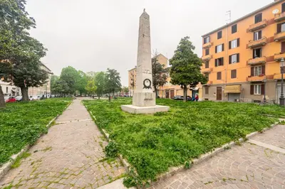 Giardino di GuestHost - Borgo Bliss in Parma's San Giuseppe District