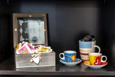 Set per la preparazione di tè e caffè presso [Duomo] Delizioso appartamento nel cuore di Modena