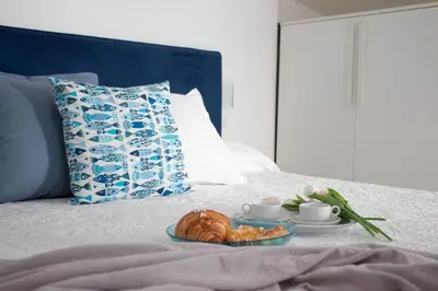 Letto o letti in una camera di Sestri Chic - A Due Passi dal Mare