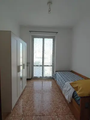 Letto o letti in una camera di La vie en rose flat