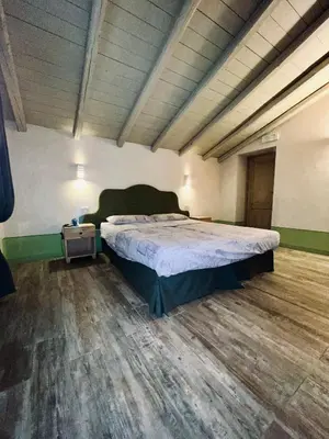 Letto o letti in una camera di Chaledo Milagro