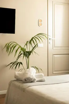 Letto o letti in una camera di San Benedetto Rooms