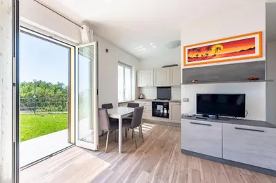 Cucina o angolo cottura di JOIVY Villa Guanna - Charming Flat with Garden