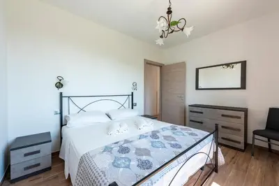 Letto o letti in una camera di JOIVY Villa Guanna - Charming Flat with Garden