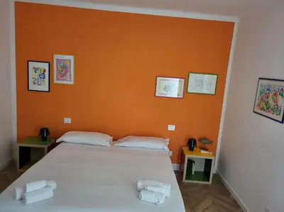 Letto o letti in una camera di Casa del Golfo 2
