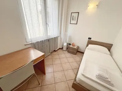 Letto o letti in una camera di Casa Gilda, in centro a Mantova