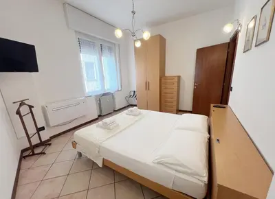 Letto o letti in una camera di Casa Gilda, in centro a Mantova