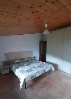 Letto o letti in una camera di La casa di Amelia