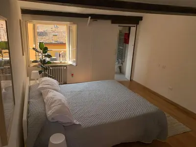 Letto o letti in una camera di Domus Pioppa