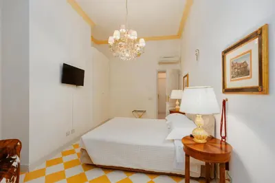 Letto o letti in una camera di Casa San Domenico