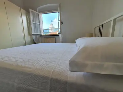Letto o letti in una camera di Mazzini Chiosco vicino a Portofino