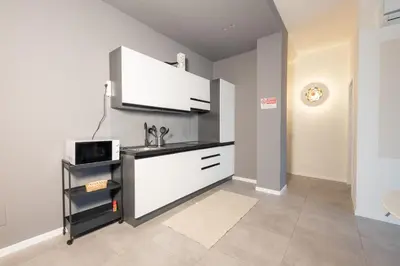 Cucina o angolo cottura di Guesthouse Rosa di Parma